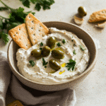 How to make Dirty Martini Dip — key cooking step